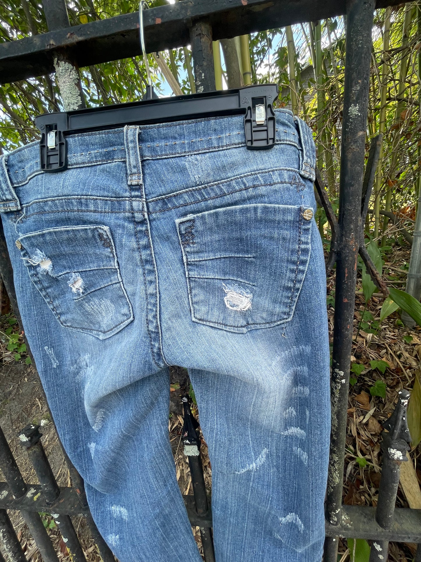 Distressed denim jeans, ankle length jeans, reloved clothing denim