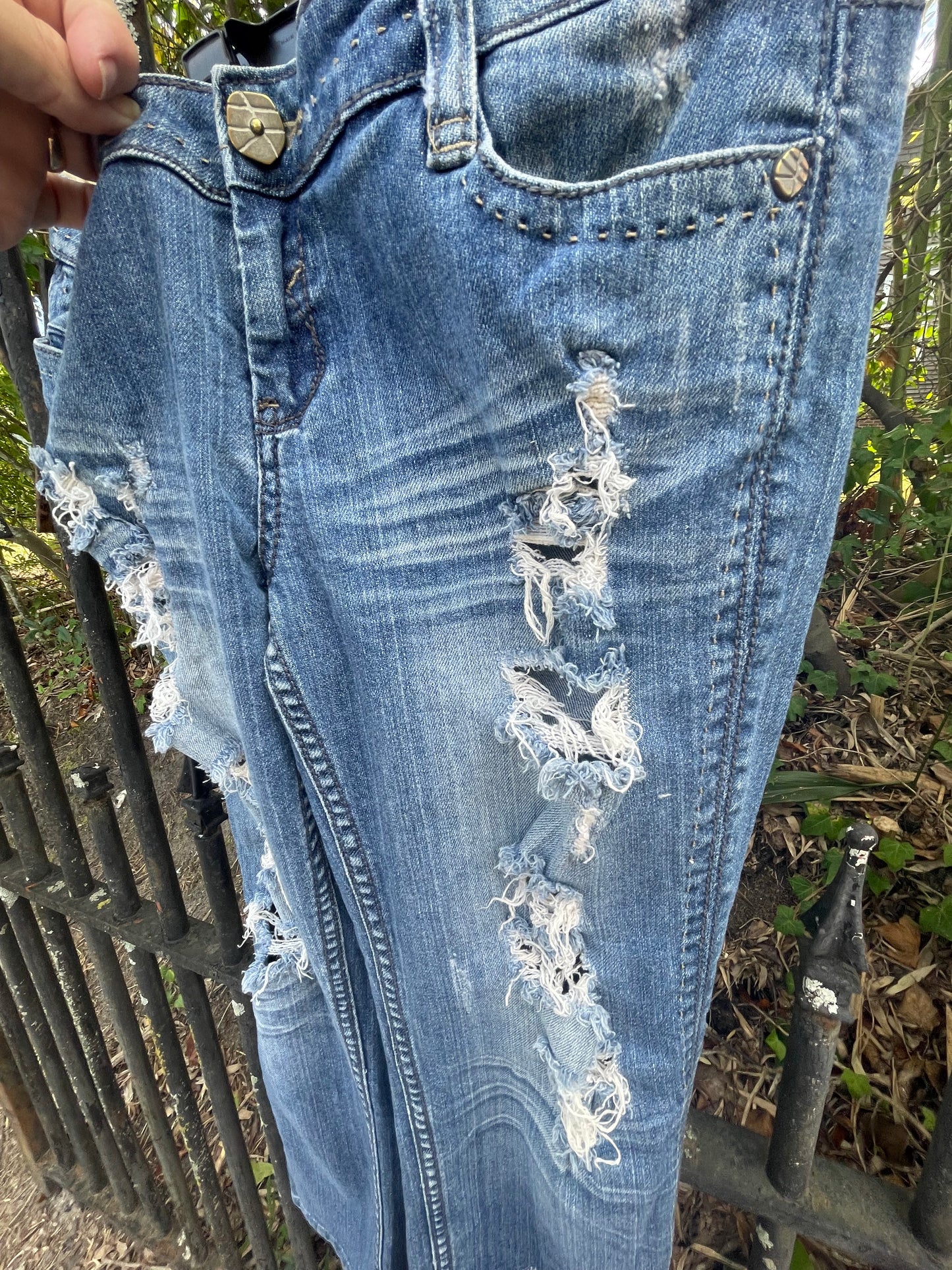 Distressed denim jeans, ankle length jeans, reloved clothing denim