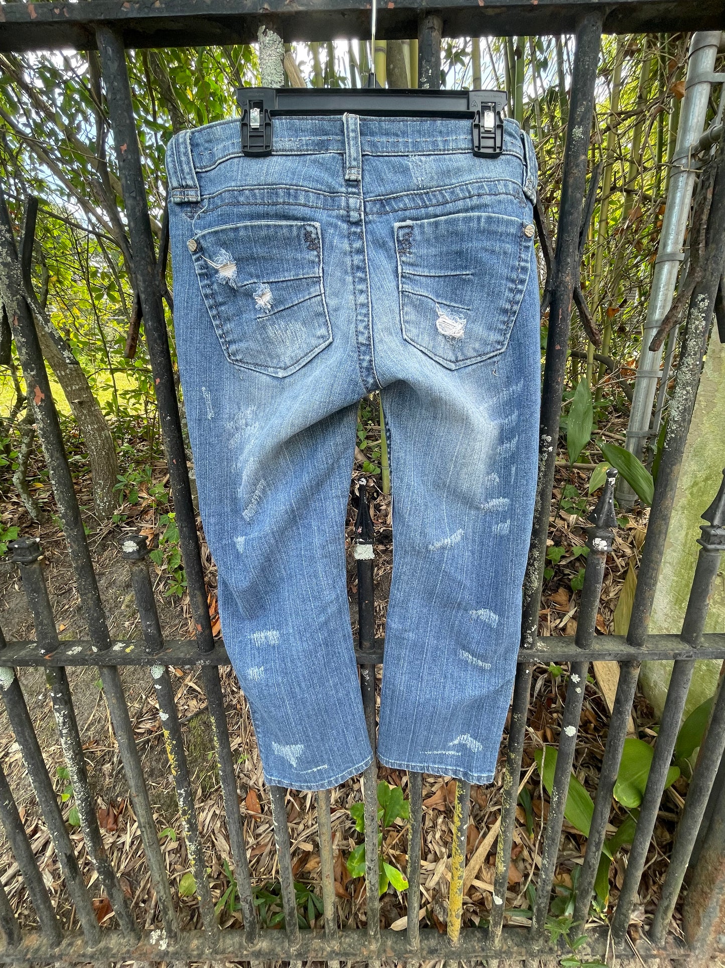 Distressed denim jeans, ankle length jeans, reloved clothing denim