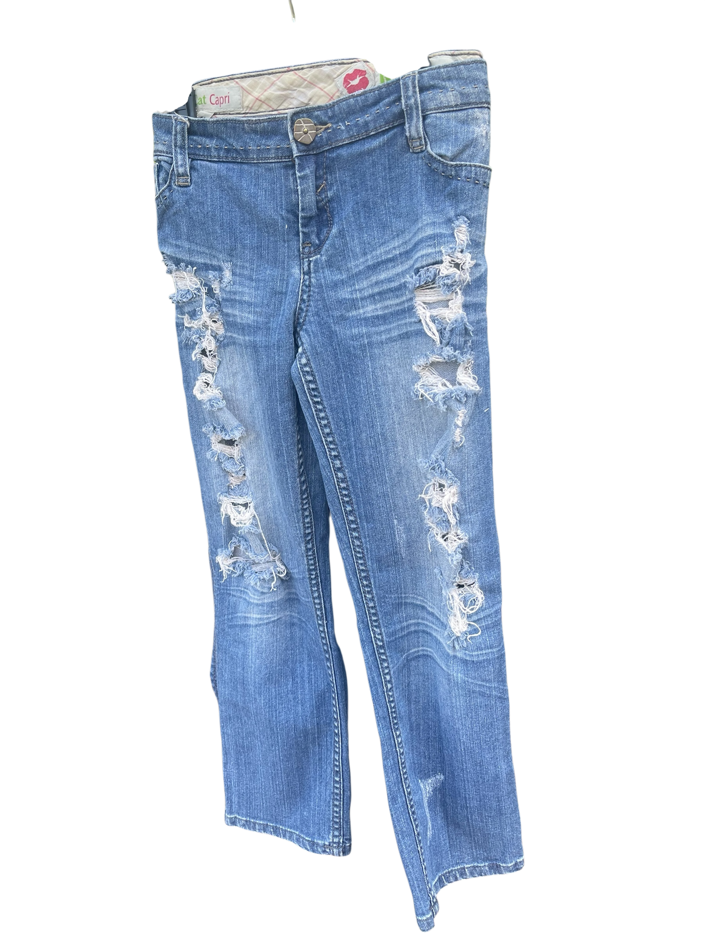 Distressed denim jeans, ankle length jeans, reloved clothing denim
