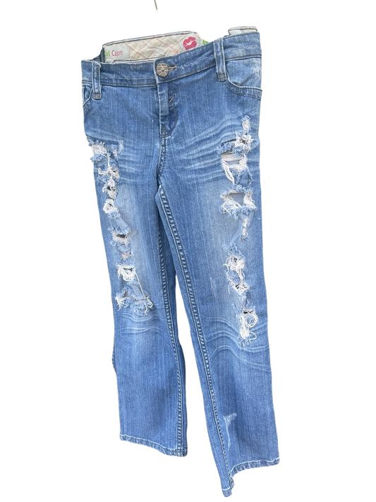 Distressed denim jeans, ankle length jeans, reloved clothing denim