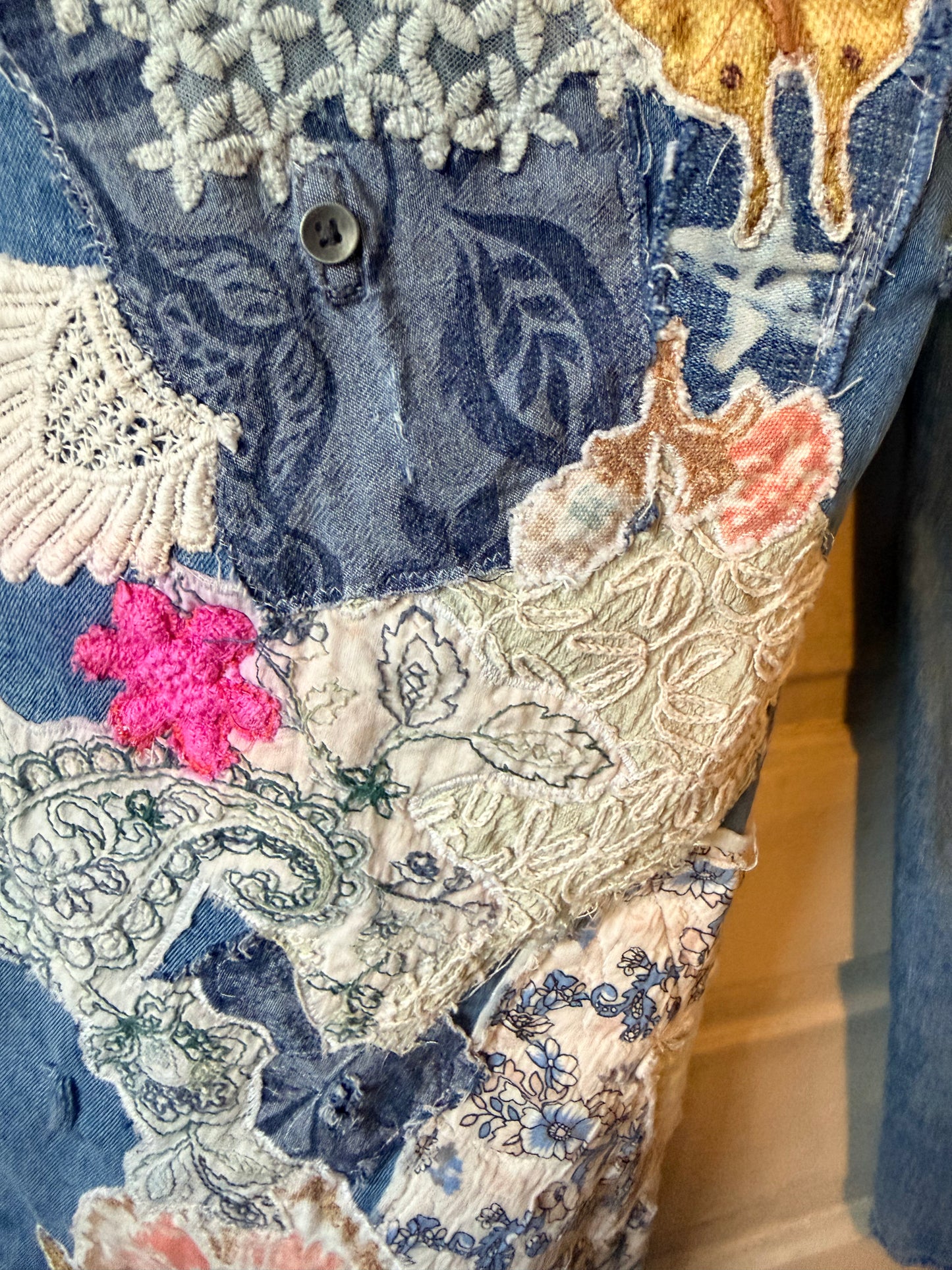 Patchwork upcycled denim jeans, boho hippie style distressed denim, front and frayed jeans