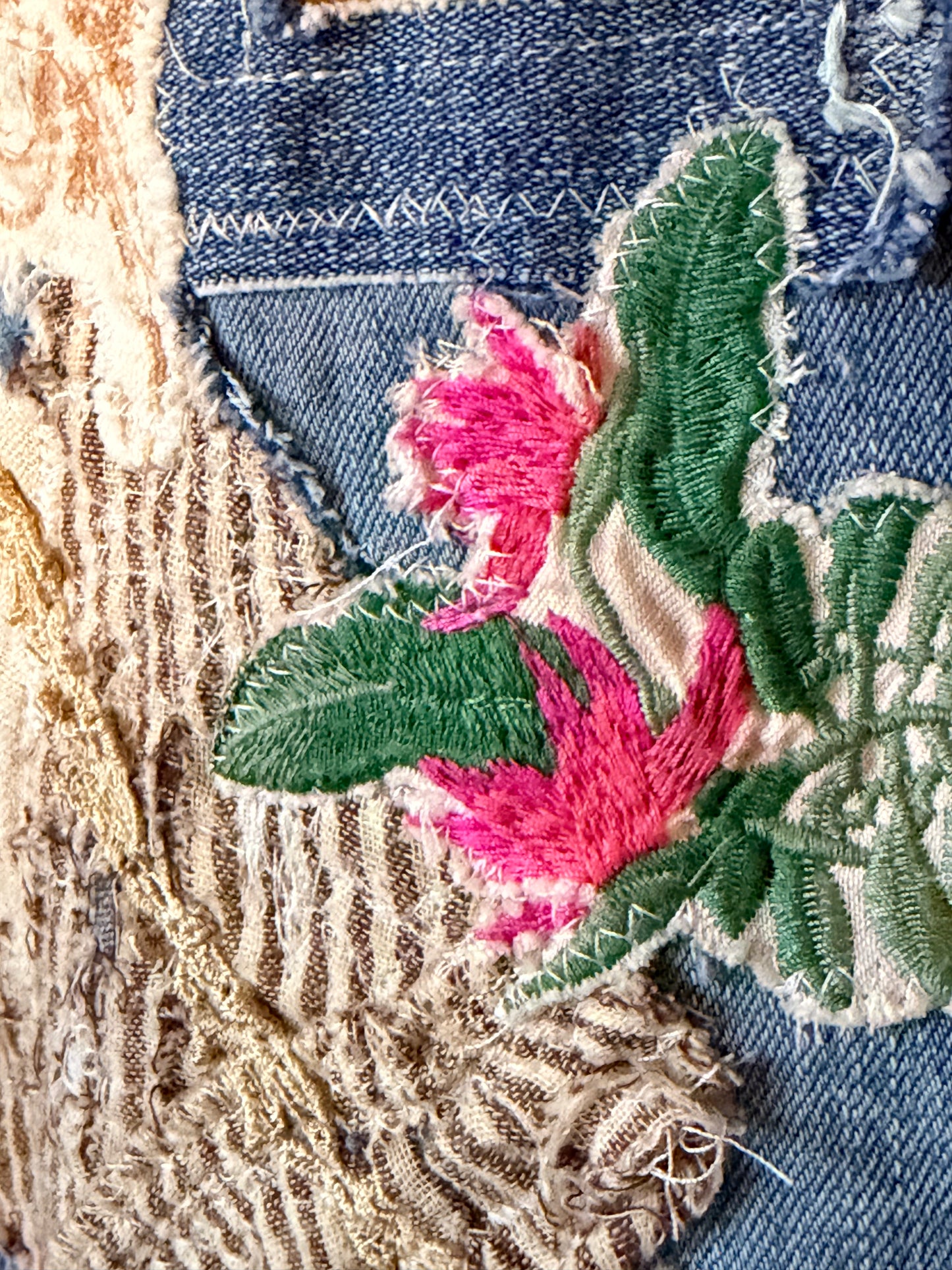 Patchwork upcycled denim jeans, boho hippie style distressed denim, front and frayed jeans
